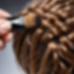 Close-up of a round brush with hair strands wrapped around it, illustrating the braiding technique.