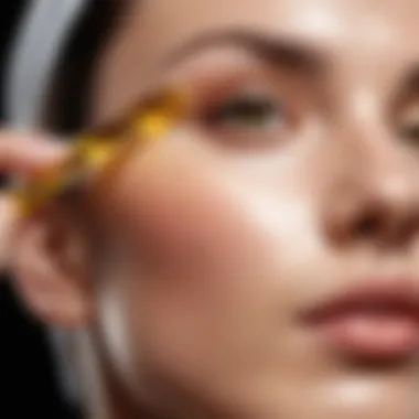 Close-up of cleansing oil being applied to face