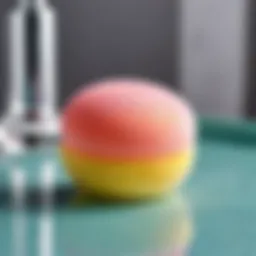 Close-up view of a clean makeup sponge resting on a vanity