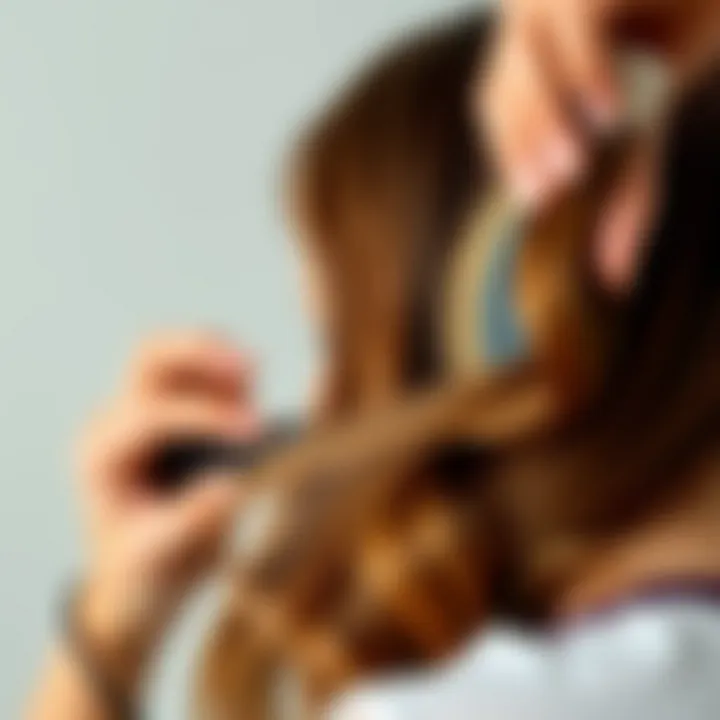 A demonstration of styling techniques using a round brush on hair.